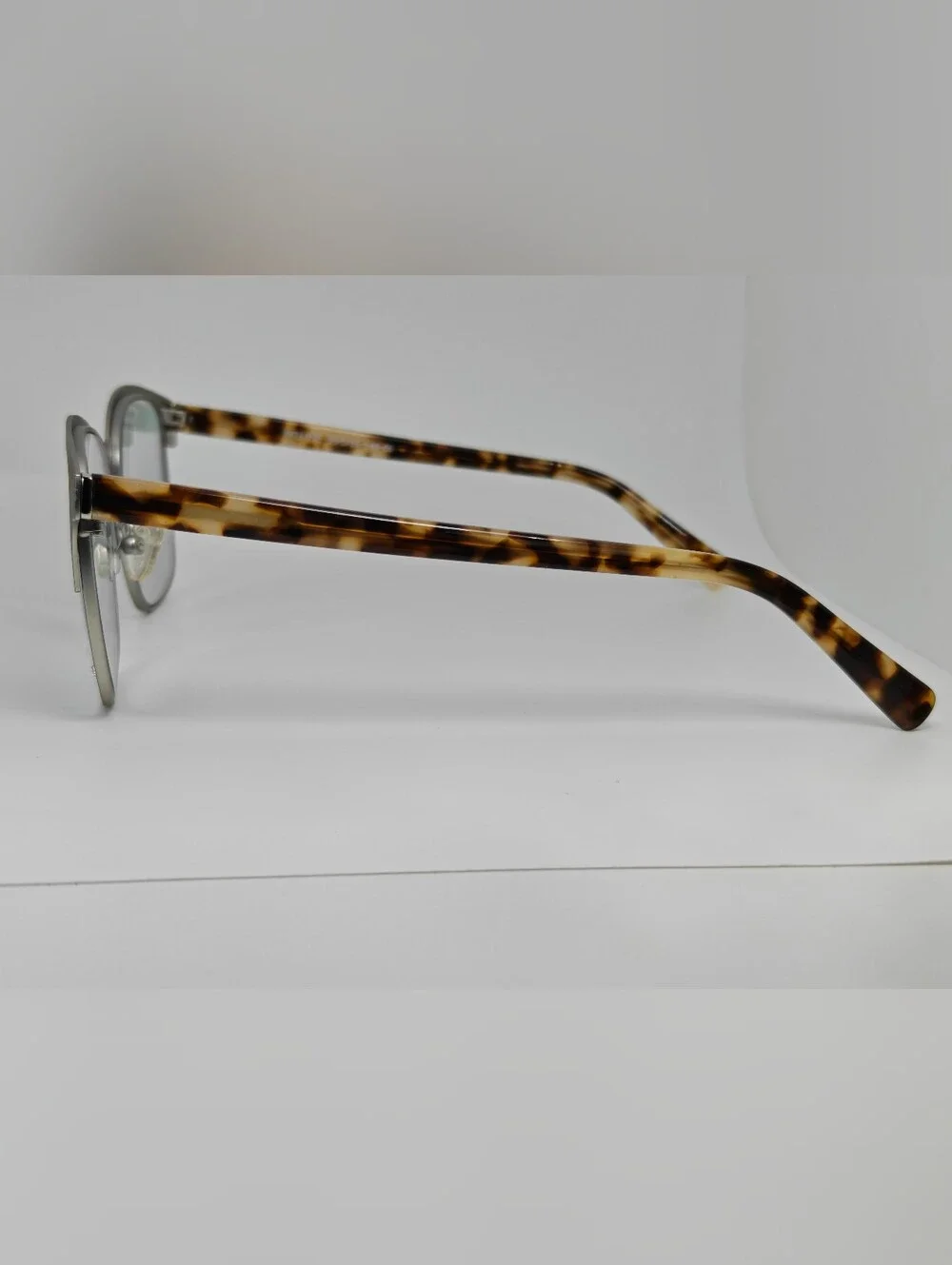 Intense. Brushed Silver Front, Bone Tortoise Temples. Women's.